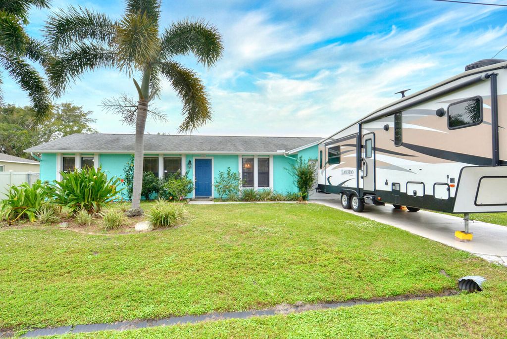 Photo of 2456 SE Rival Avenue, Port Saint Lucie, FL 34952 (MLS # R10949391)