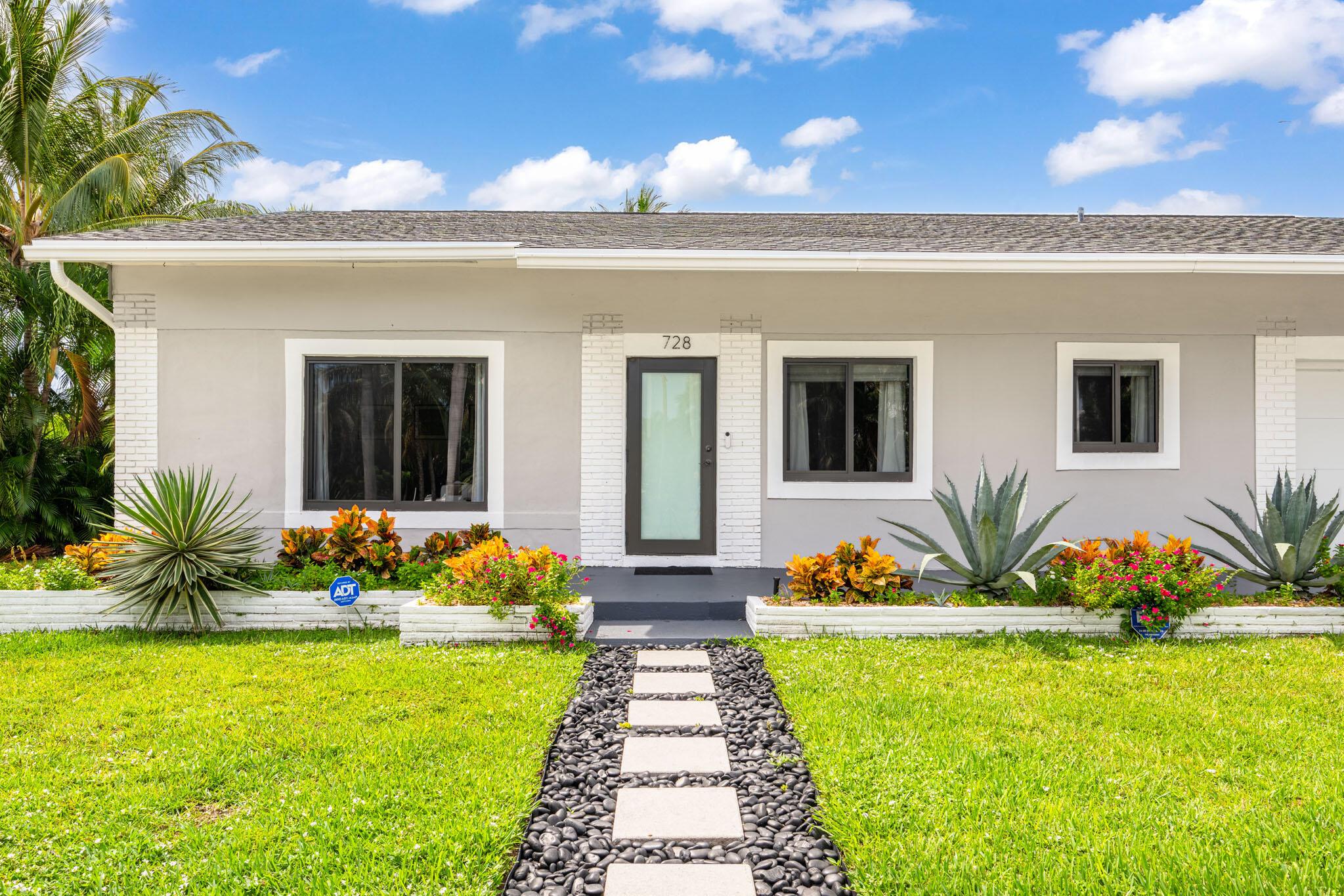 Welcome to this beautifully updated 2 bed, 2 bath home in the heart of Boynton Beach. With modern curb appeal, lush landscaping, and a bright open floor plan, this home is designed for both comfort and style. Tile floors flow throughout the spacious living and dining areas, creating an inviting space for entertaining. Step outside and enjoy your private backyard retreat or take advantage of the home's prime location just minutes from the Intracoastal, waterfront dining, boating, shopping, and beaches. Experience the best of coastal Florida living in this charming home.