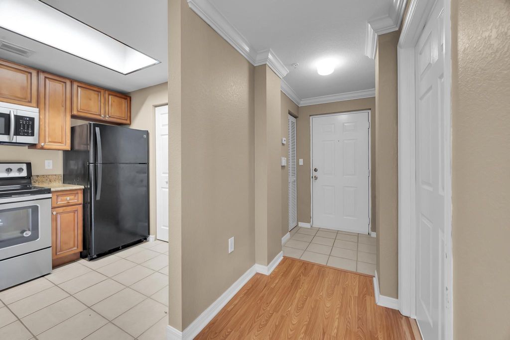 Photo of 2808 Amalei Drive #201, Palm Beach Gardens, FL 33410 (MLS # R11076441)