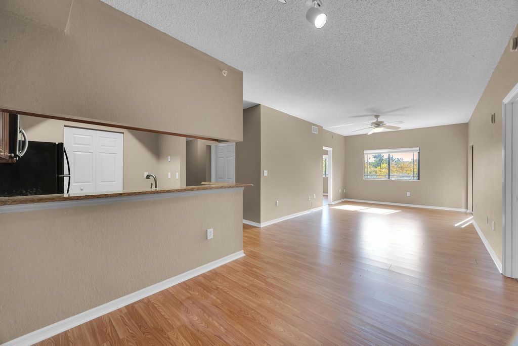 Photo of 2808 Amalei Drive #201, Palm Beach Gardens, FL 33410 (MLS # R11076441)