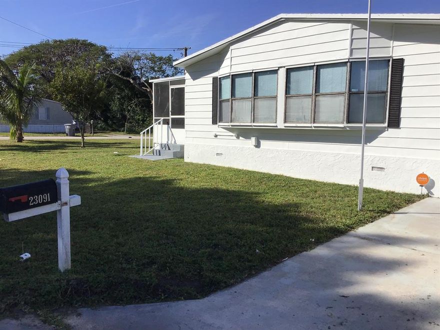Newly updated mobile homes on oversized corner lot in quiet area of Watergate. Owner finance with $30K down 2 sheds, one with electric. YOU OWN THE LAND. NO HOA open family and dining room. White kitchen.