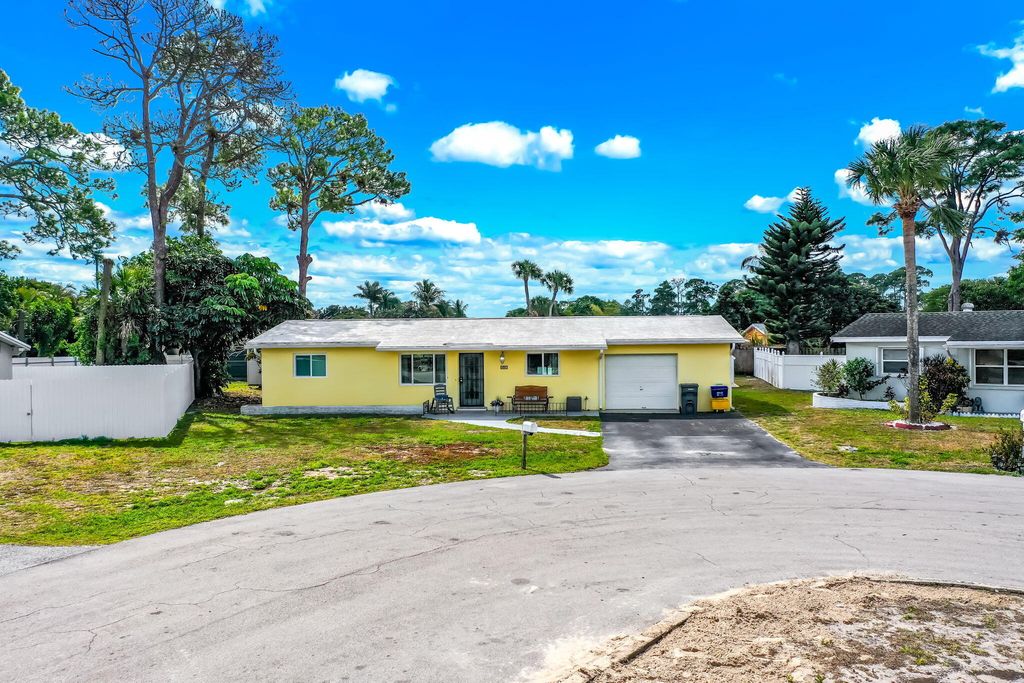 Photo of 691 Snead Cir, West Palm Beach, FL 33413 (MLS # B26000799)