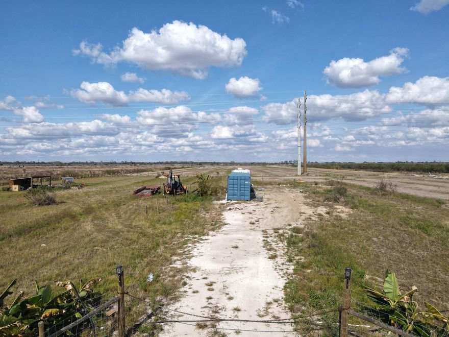 13.3 improved acres ready to farm, use for cattle or build a home. Cleared and fenced with a small pond and well in place. Permits for the electric have already been submitted. Property has a storage container and shed. Motivated seller.