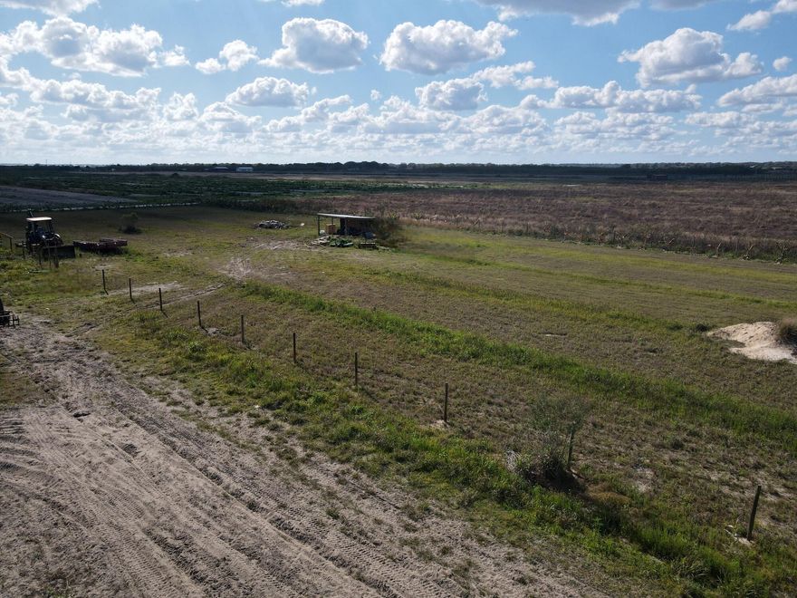 13.3 improved acres ready to farm, use for cattle or build a home. Cleared and fenced with a small pond and well in place. Permits for the electric have already been submitted. Property has a storage container and shed. Motivated seller.