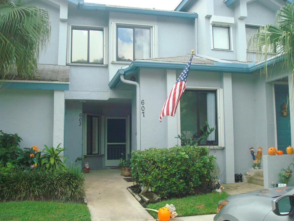 Photo of 603 Harbour Pointe Way Way, Green Acres, FL 33413 (MLS # R10766150)