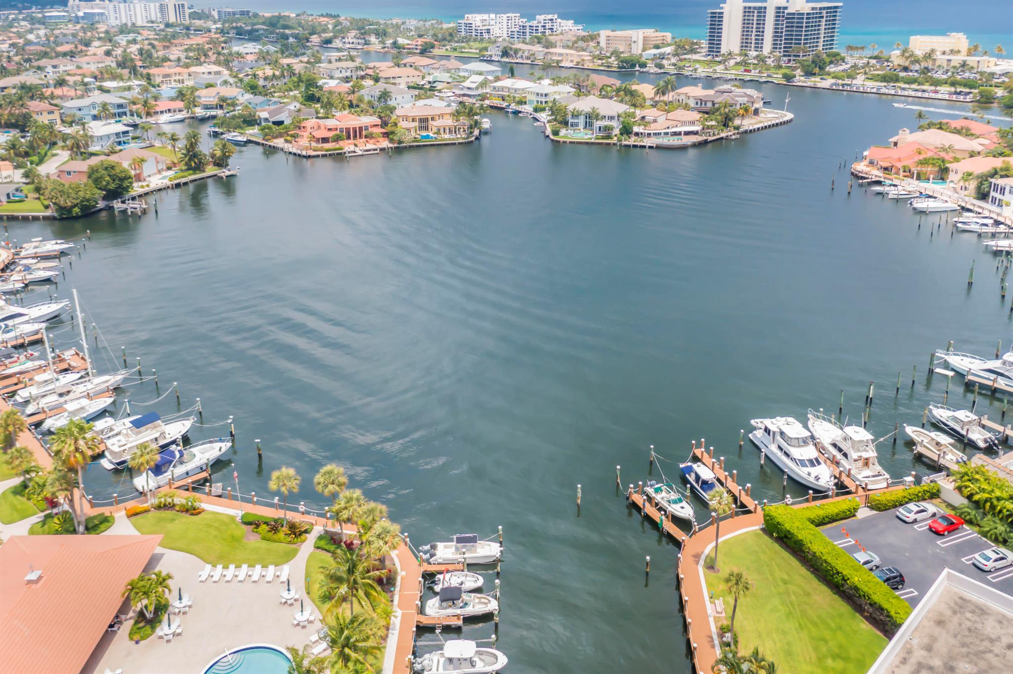 LOCATION, LOCATION, LOCATION. 2 Bedroom, 2 Bath, 1st floor condo.  COMPLETELY RENOVATED, Tile throughout, Kitchen has custom wood cabinetry, Open Plan Living, entrance leading to Dining/Living Room. 2 ensuite Bathrooms in each Bedroom. Amenities include, new gym, clubhouse newly renovated, card/library. East of Federal, close to beach, equal distance to both West Palm & Fort Lauderdale Airports. Close to well known Atlantic Ave., with numerous shops, restaurants & bars for all types of food & activities for all ages. Washer/dryers on 2nd & 4th floors. Parking Space #512. This unit is immaculate & ready for occupancy.  Association requires 30 day approval period. Come join in on the fun! CLEAN UPDATED UNIT IS WAITING FOR YOU. THIS ONE WON'T LAST!