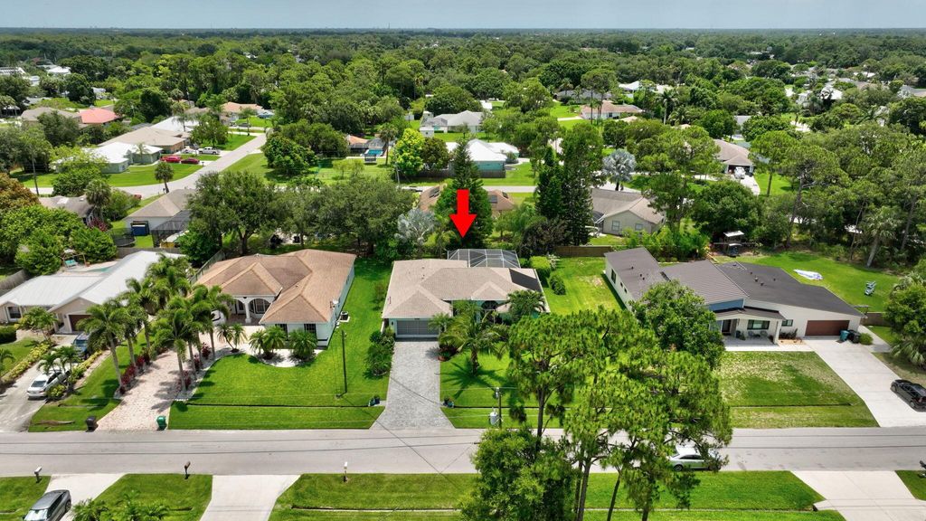 Photo of 2381 SW Indigo Lane, Port Saint Lucie, FL 34953 (MLS # R11094650)