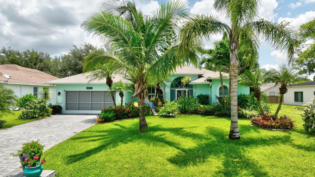 Photo of 2381 SW Indigo Lane, Port Saint Lucie, FL 34953 (MLS # R11094650)