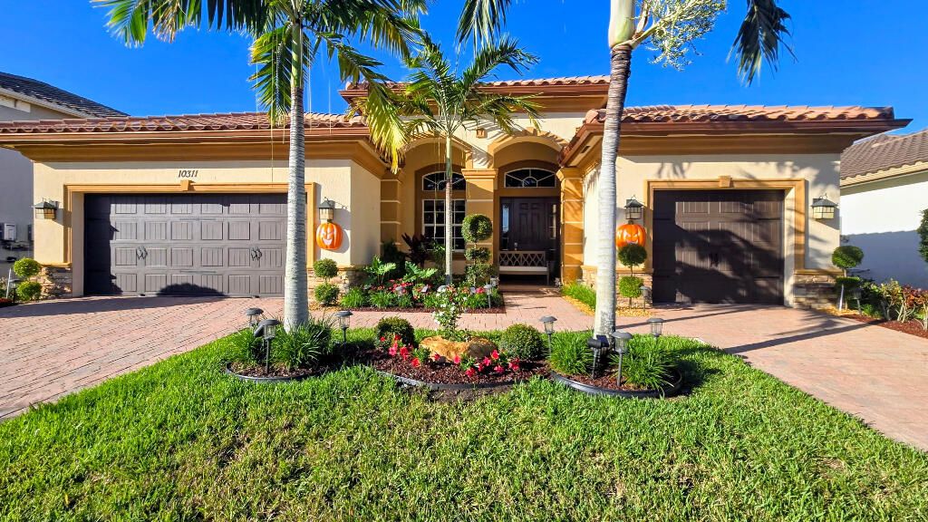 Photo of 10311 Peninsula Place, Parkland, FL 33076 (MLS # B26011747)