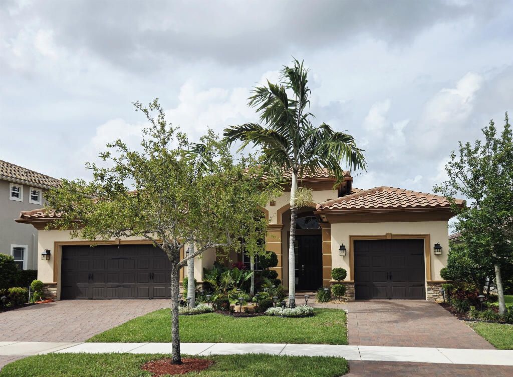 Photo of 10311 Peninsula Place, Parkland, FL 33076 (MLS # B26011747)