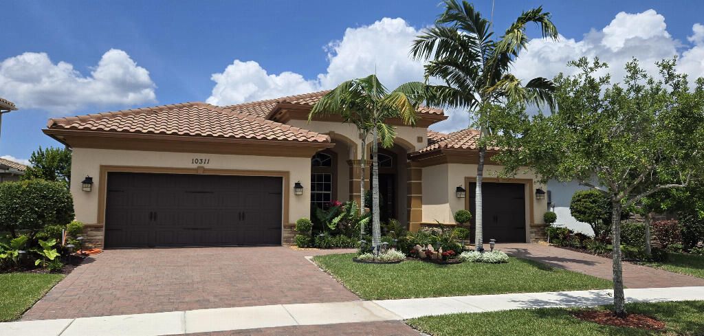 Photo of 10311 Peninsula Place, Parkland, FL 33076 (MLS # B26011747)