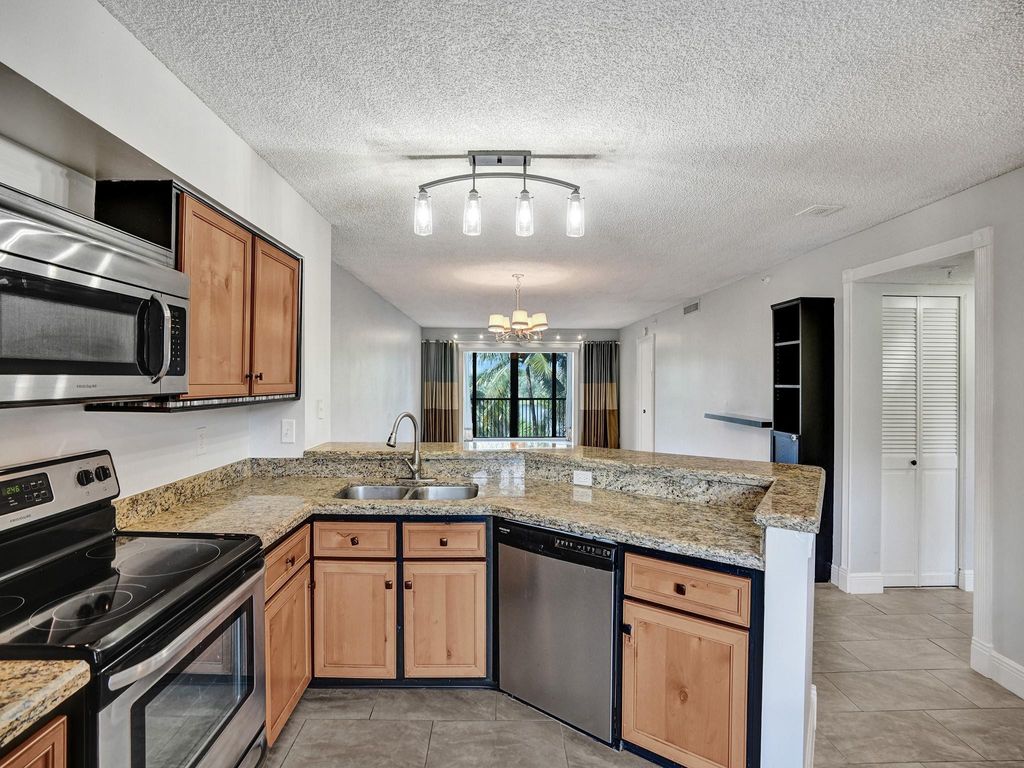 Photo of 2205 S Cypress Bend Drive #402, Pompano Beach, FL 33069 (MLS # F10434133)