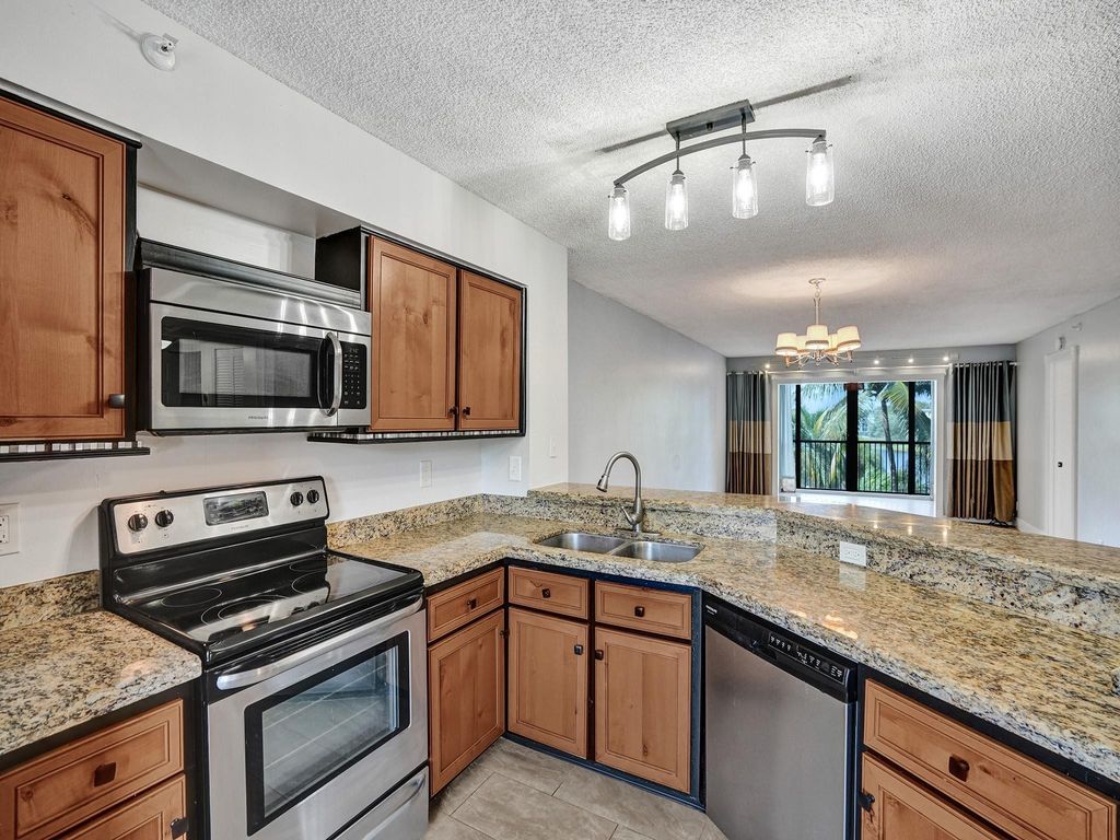 Photo of 2205 S Cypress Bend Drive #402, Pompano Beach, FL 33069 (MLS # F10434133)