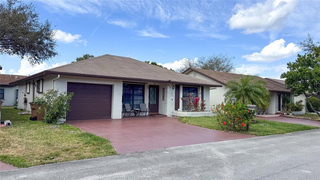 Photo of 1719 SW 19th Avenue, Deerfield Beach, FL 33442 (MLS # F10537054)