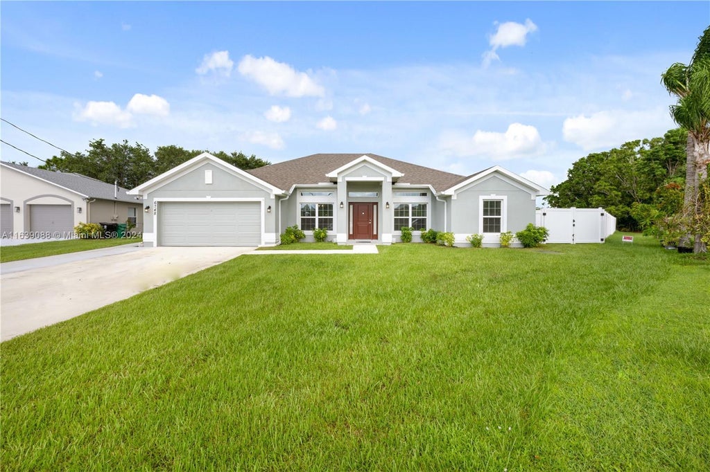 Photo of 6748 NW Mamie Court, Port Saint Lucie, FL 34983 (MLS # R11062987)