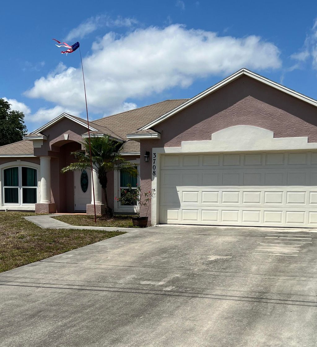 Photo of 3708 SW Hale Street, Port Saint Lucie, FL 34953 (MLS # R10793618)