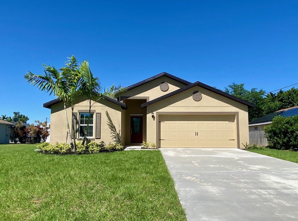 Photo of 1120 SW Khan Drive, Port Saint Lucie, FL 34953 (MLS # F10395937)