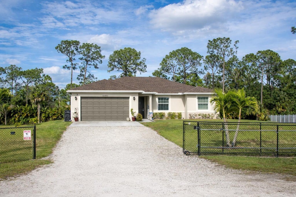 Photo of 12601 57th Road N, West Palm Beach, FL 33411 (MLS # B26030235)