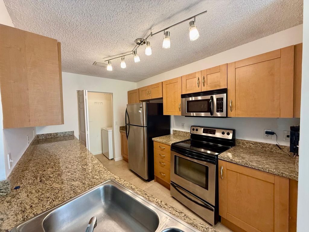 Photo of 3299 Clint Moore Road #202, Boca Raton, FL 33496 (MLS # B26024707)