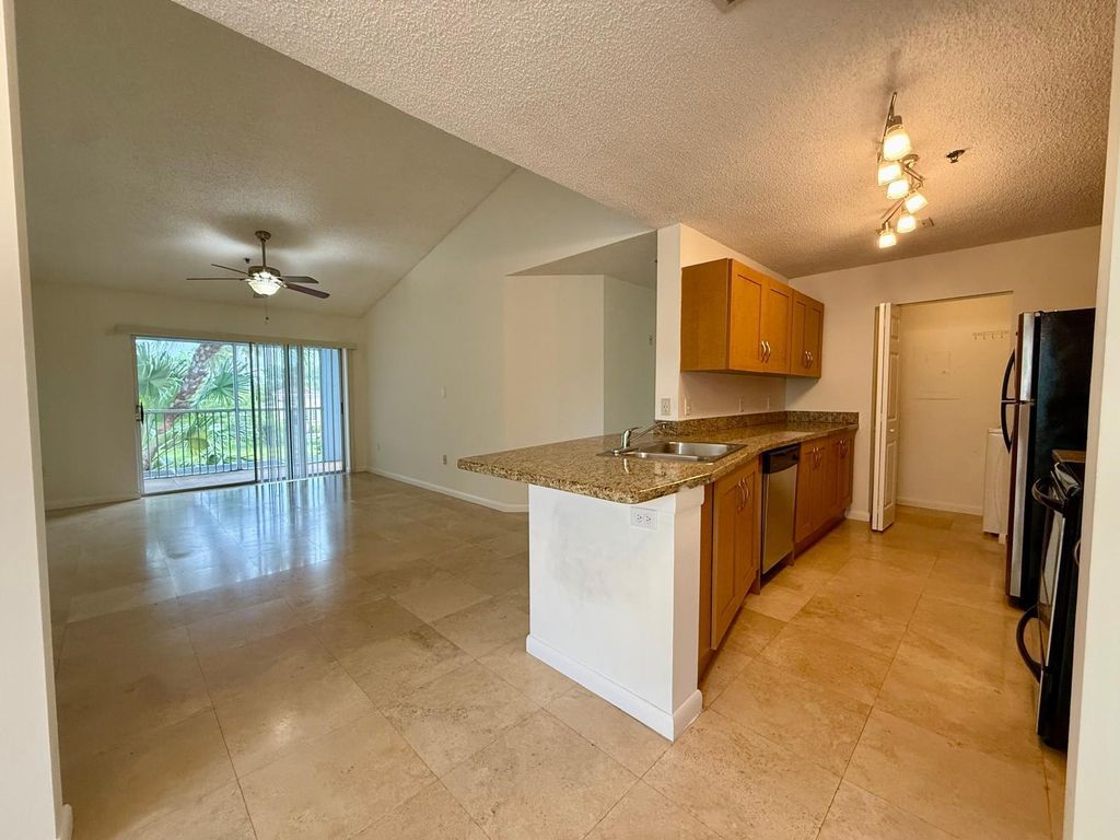 Photo of 3299 Clint Moore Road #202, Boca Raton, FL 33496 (MLS # B26024707)