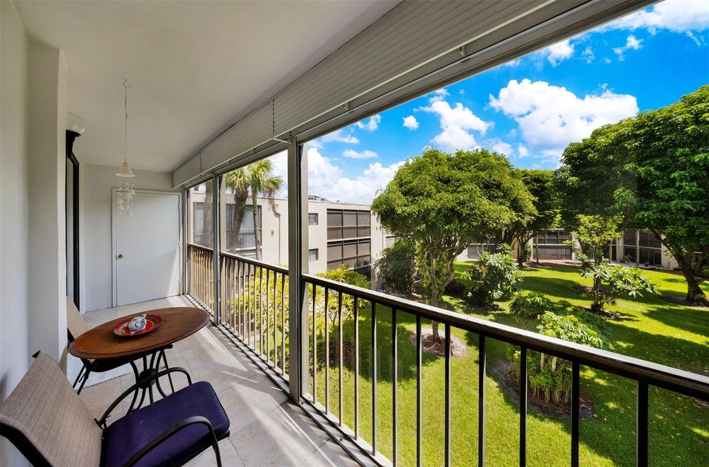 Photo of 5250 Las Verdes Circle #317, Delray Beach, FL 33484 (MLS # B26028231)
