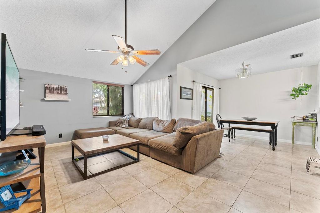 Photo of 1615 Woodbridge Lakes Circle, West Palm Beach, FL 33406 (MLS # R10977694)