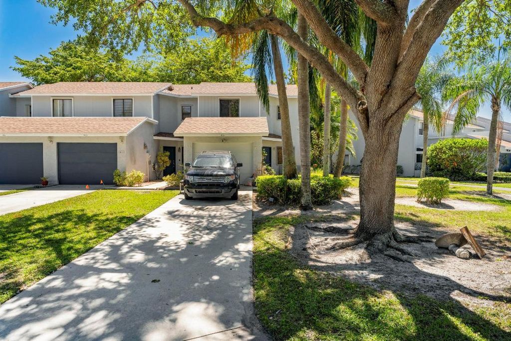 Photo of 1615 Woodbridge Lakes Circle, West Palm Beach, FL 33406 (MLS # R10977694)