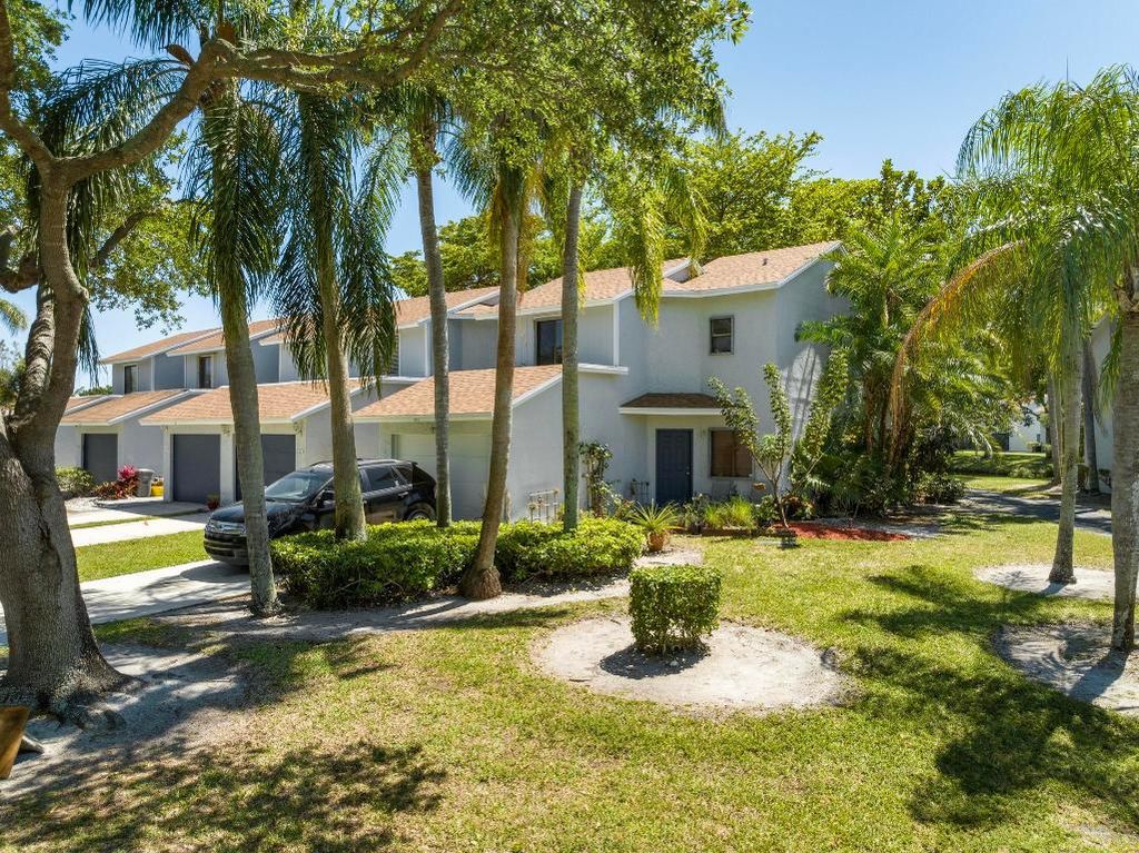 Photo of 1615 Woodbridge Lakes Circle, West Palm Beach, FL 33406 (MLS # R10977694)