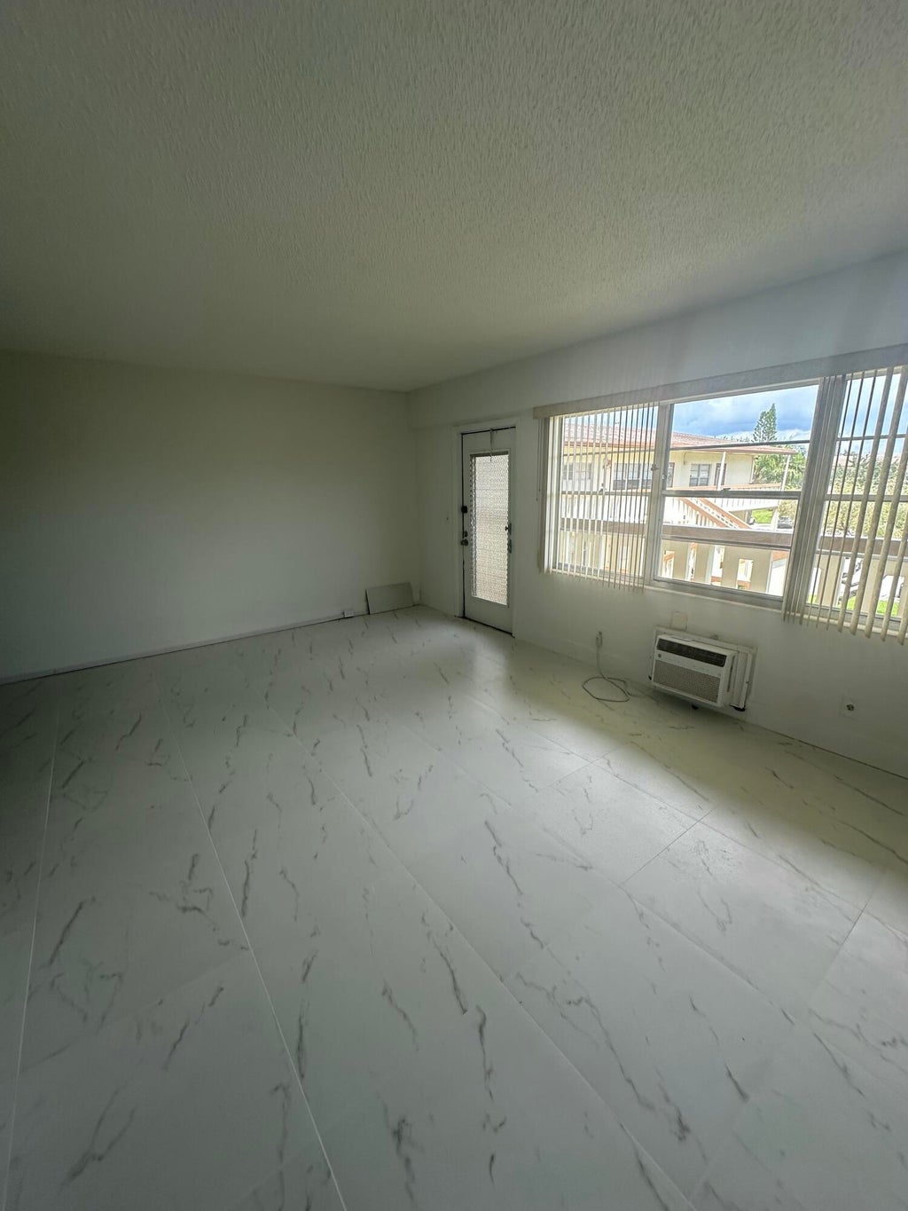 Photo of 205 MANSFIELD Way E, Boca Raton, FL 33434 (MLS # B26068330)