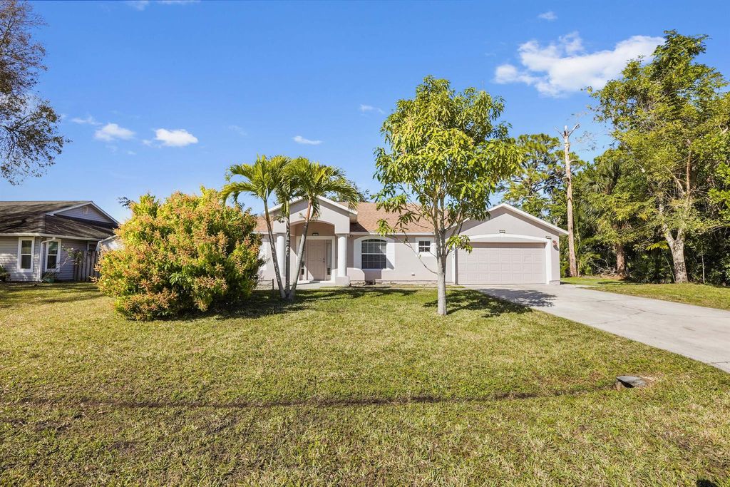 Photo of 2411 SE Alfonso Avenue, Port Saint Lucie, FL 34952 (MLS # R11056857)