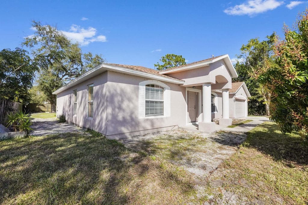 Photo of 2411 SE Alfonso Avenue, Port Saint Lucie, FL 34952 (MLS # R11056857)