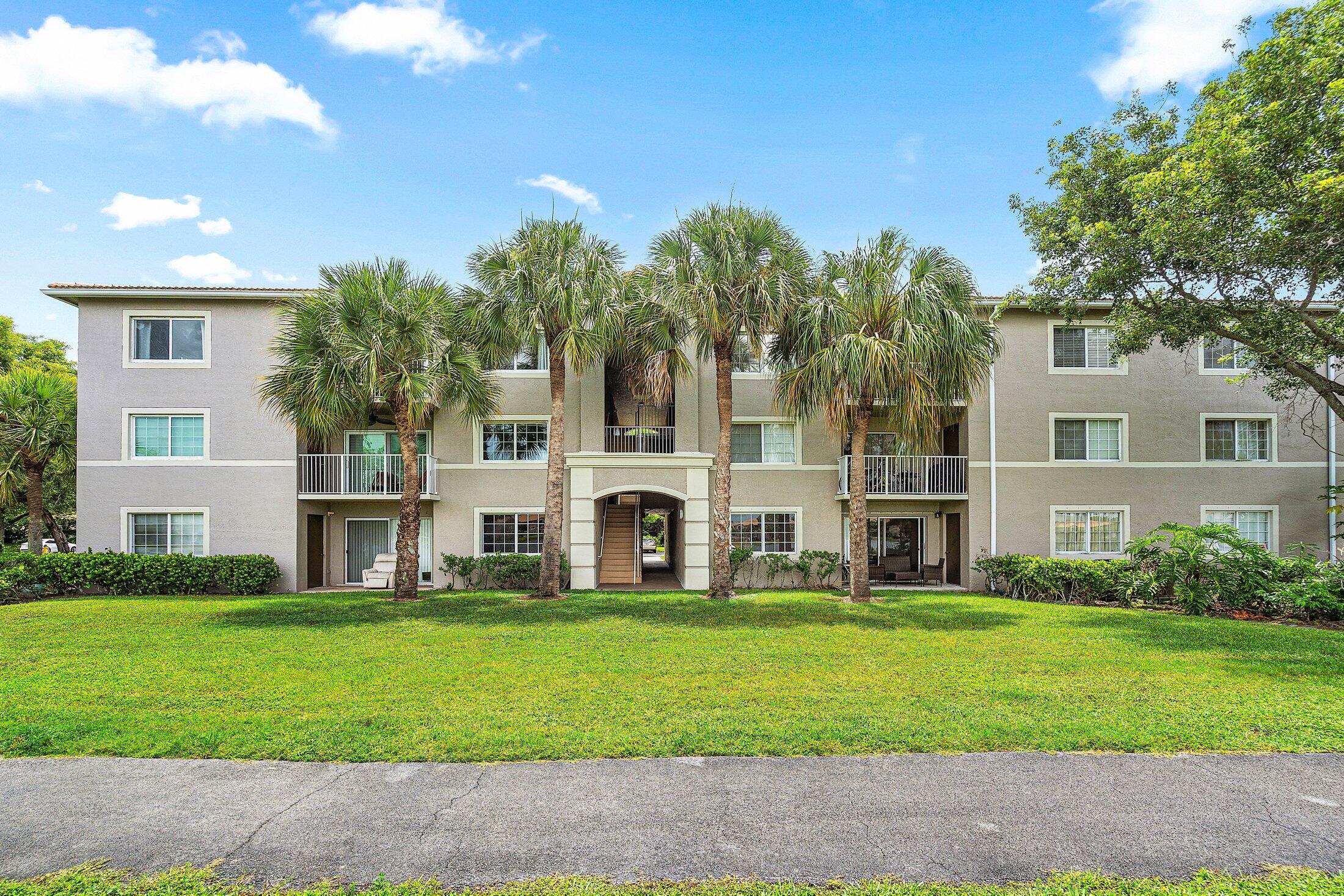 Beautifully maintained and move-in ready residence located in the desirable Evergreen community of Coconut Creek. This charming first-floor unit has been recently painted, offering a clean and modern aesthetic throughout. Enjoy peace of mind with a 2-year-old A/C system (inside and out), a 3-year-old water heater, and a full suite of stainless steel appliances that are just 2 years old. The in-unit washer and dryer are also in excellent condition at only 3 years old. Complete hurricane shutters provide added security and storm protection. With its East-facing exposure, the home welcomes soft morning sunlight and a serene atmosphere.