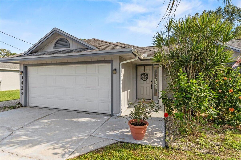 Photo of 1434 SW Glastonberry Avenue, Port Saint Lucie, FL 34953 (MLS # R10955765)