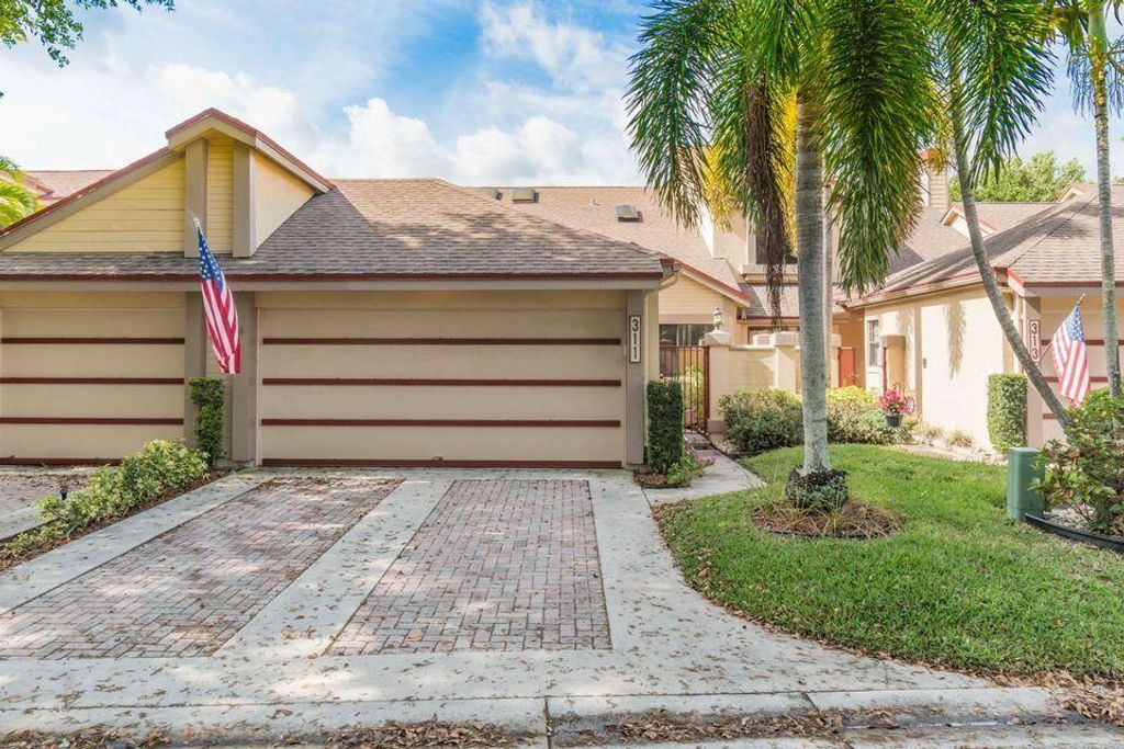 Photo of 311 Landings Boulevard Blvd, Green Acres, FL 33413 (MLS # R10767600)