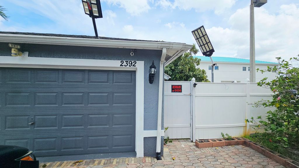 Photo of 2392 Kirk Road, Palm Springs, FL 33406 (MLS # B26004867)