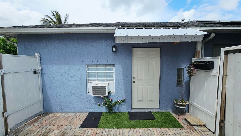 Photo of 2392 Kirk Road, Palm Springs, FL 33406 (MLS # B26004867)