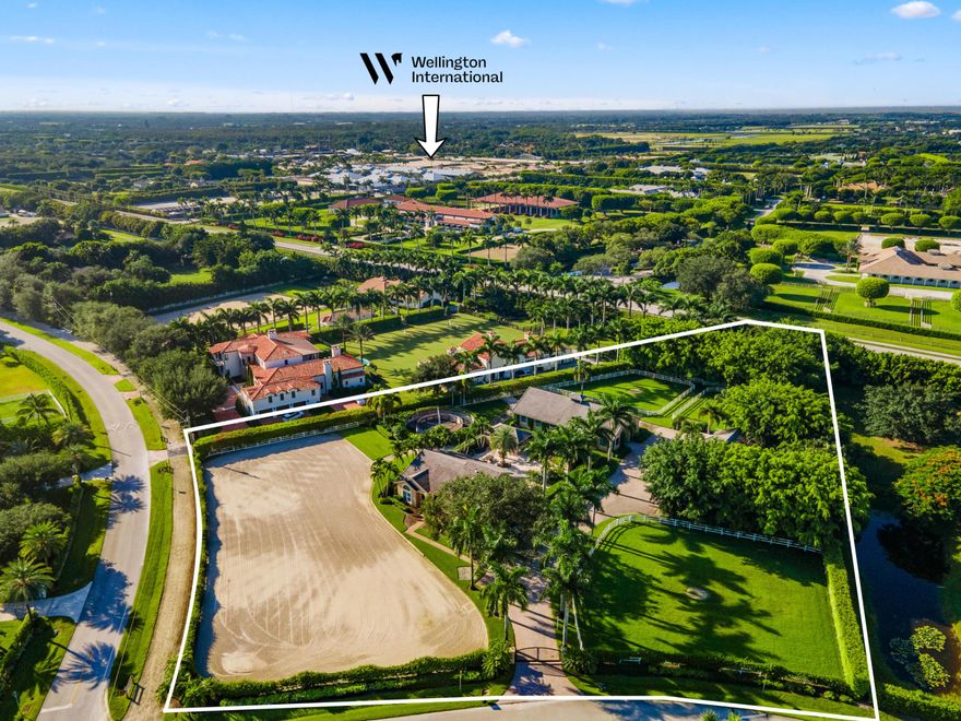 Hand walk your horse to Wellington International!

Located less than 1/3 of a mile from the entrance of WEF, this exceptional equestrian property offers unmatched convenience paired with thoughtfully designed amenities.
(Interior House Photos Coming Soon!)
The charming 4-bedroom, 3-bathroom residence has been recently renovated and features hurricane-impact windows, new wood-tile flooring, and a beautifully updated kitchen with an oversized island.

At the heart of the property is a lovely 8-stall center-aisle barn, designed with both functionality and comfort in mind--with allowance to add two additional stalls if desired. Additional highlights include:
    •    Four lush, grassy paddocks
    •    A 4-horse walker
    •    Two 1-bedroom, 1-bathroom staff apartments -A new sand/clay arena measuring approximately 245' x 115'
-Spacious barn garage with ample storage

Opportunities to stable within walking distance of WEF are rare! Schedule your private tour today!