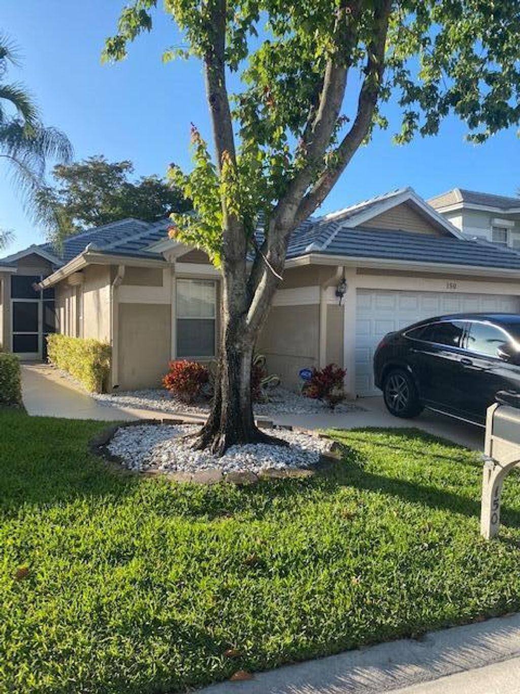 Photo of 150 Harbor Lake Circle, Greenacres, FL 33413 (MLS # R10798622)