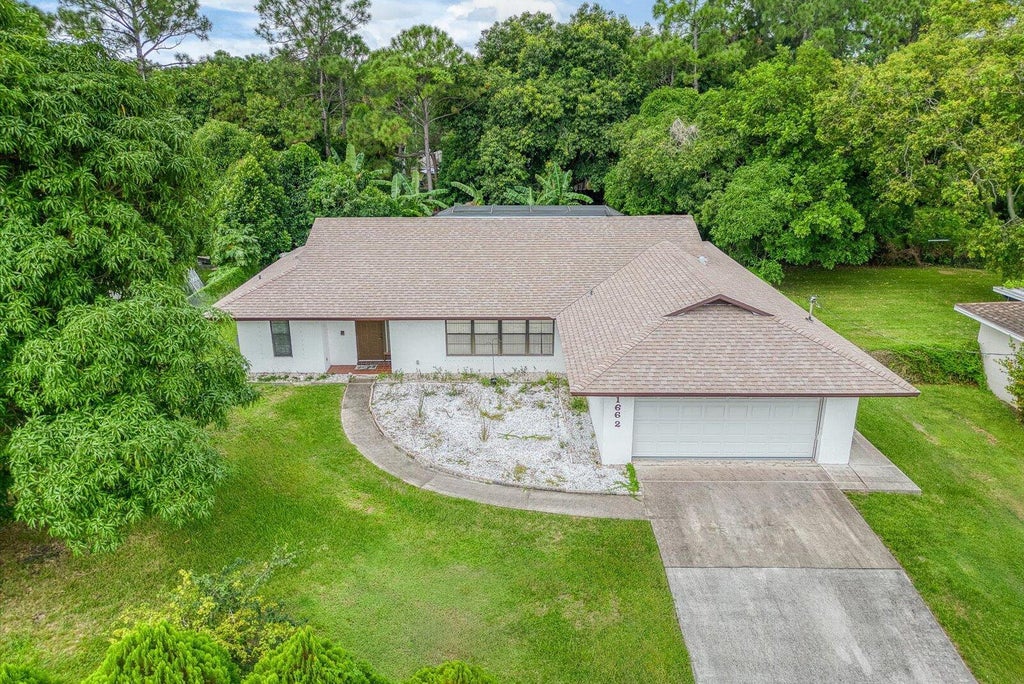 Photo of 1662 SW Airoso Boulevard, Port Saint Lucie, FL 34984 (MLS # R11021195)