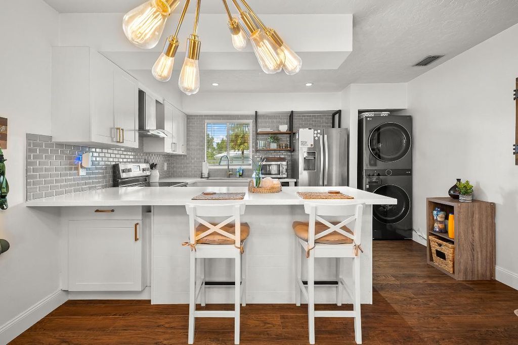 Photo of 197 SE Village Drive #197, Port Saint Lucie, FL 34952 (MLS # R11130534)