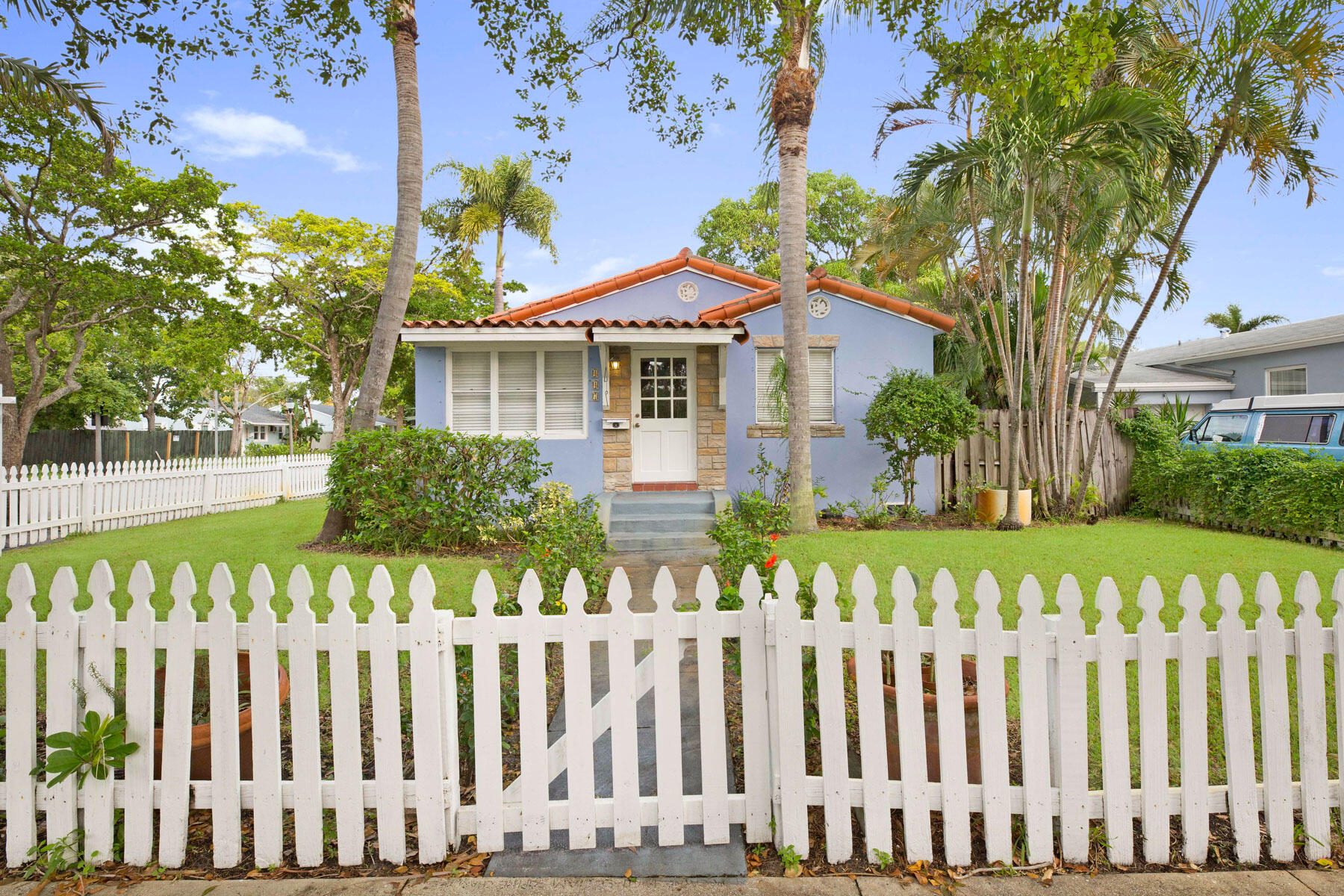 Charming Key West Style home in the heart of Old Historic Northwood. This outstanding property has a light filled 3-bedroom 1 bath main house with an open floor plan and split bedrooms. Gracious entry allows for privacy and additional usable space. the main house has covered parking, separate laundry area and a large private side yard. The property also has a 713 sq foot 1 bedroom cottage with its entrance on Spruce providing complete privacy for its occupant and homeowner. This ideally located property is a short walk to the intracoastal, less than 4 miles to downtown WPB and Palm Beach Island. A perfect winter getaway for extended family, vacation rental, investment property or an owner that wants to offset expenses with the rental cottage. Very well priced for its options.
