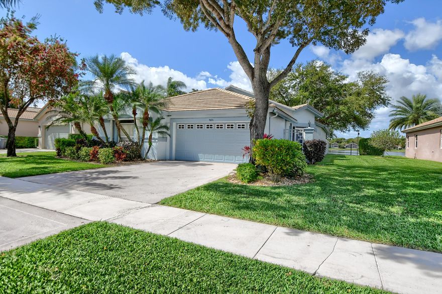 JUST REDUCED BEAUTIFUL MAINTAINED 3 BEDROOM CONTEMPORARY ON WONDERFUL LAKE VIEW IN PALM ISLES. GREAT ROOM FLOOR PLAN ALLOWS FOR CASUAL OR FORMAL LIVING. NEAT & CLEAN AND WAITING FOR NEW OWNERS. ALL NEUTRAL DECOR MAKES YOUR DECORATING A BREEZE. NEUTRAL CERAMIC TILE FLOORING THROUGHOUT MAIN LIVING AREAS, AND UPDATED CARPET IN BEDROOMS. A LIGHT AND BRIGHT INTERIOR WITH OVER-SIZED WINDOWS AND SLIDERS, WHICH OVER LOOK A LOVELY WATER VIEW. THIS HOME IS PROTECTED BY  ACCORDION STYLE SHUTTERS AC 2018 . NEW OWNERS WILL ENJOY THE FULL RECREATIONAL AMENITIES AT PALM ISLES, WITH A FABULOUS CLUBHOUSE, EXERCISE ROOMS, SOCIAL GROUPS AND EVENTS, BILLIARDS, POOL AND FABULOUS TENNIS CENTER FOR YEAR ROUND ENTERTAINMENT. PALM ISLES IS A GUARD GATED COMMUNITY BOASTING THE FINEST AMENITIES AROUND.