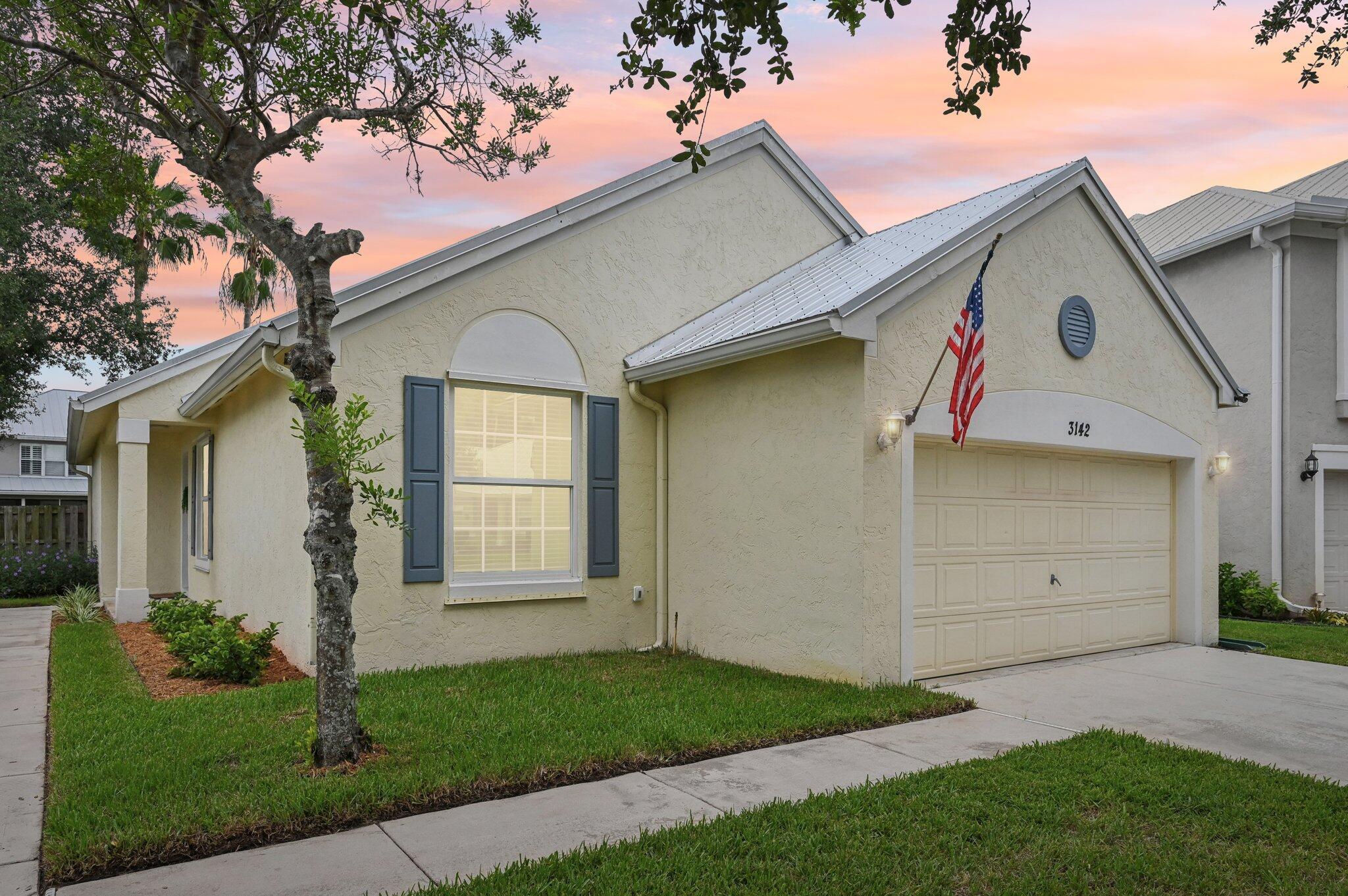 Welcome to 3142 SW Solitaire in Palm City! This remodeled 3-bedroom, 2-bath home sits on a corner cul-de-sac lot in a gated community. Featuring a brand-new roof, impact windows throughout, and a 2-car garage, it's built for peace of mind. Inside, enjoy tile floors, an updated kitchen with appliances just 2 years old, and a bright, open layout. The fenced backyard is perfect for pets or entertaining. Close to top-rated schools, shopping, and dining, this home offers the ideal blend of comfort, style, and location.