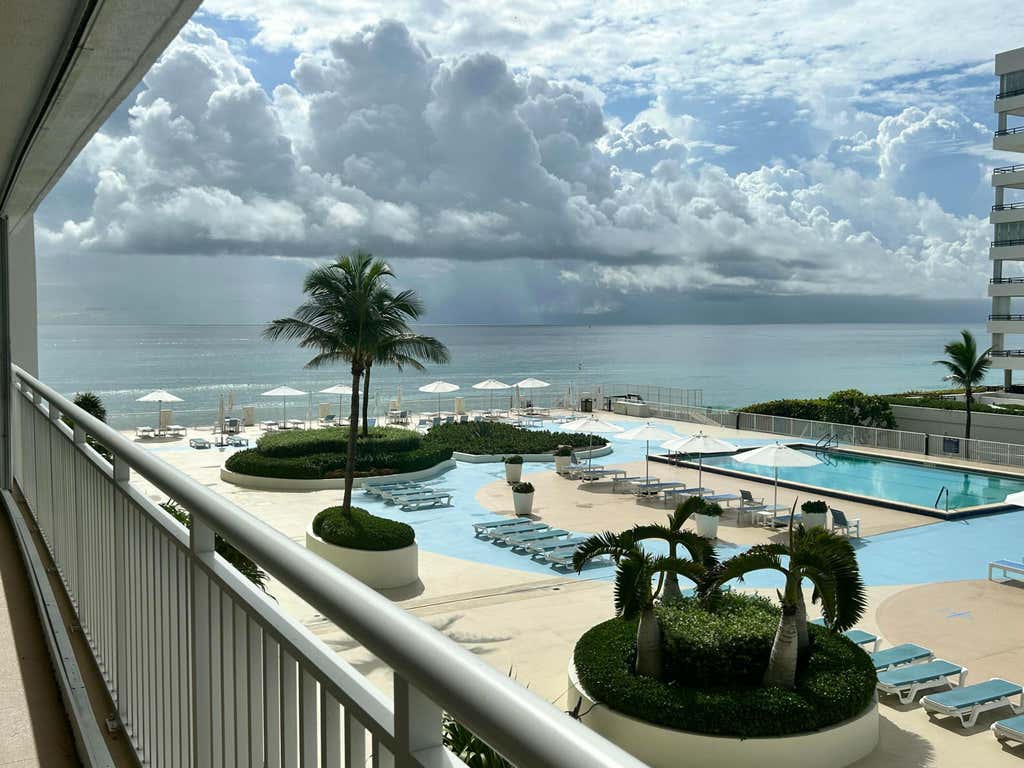 Photo of 3546 S Ocean Boulevard #405, South Palm Beach, FL 33480 (MLS # B26059785)