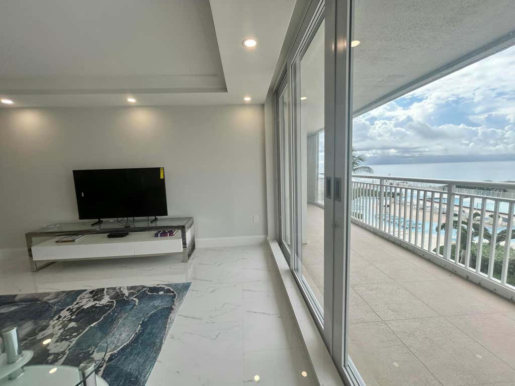 Photo of 3546 S Ocean Boulevard #405, South Palm Beach, FL 33480 (MLS # B26059785)