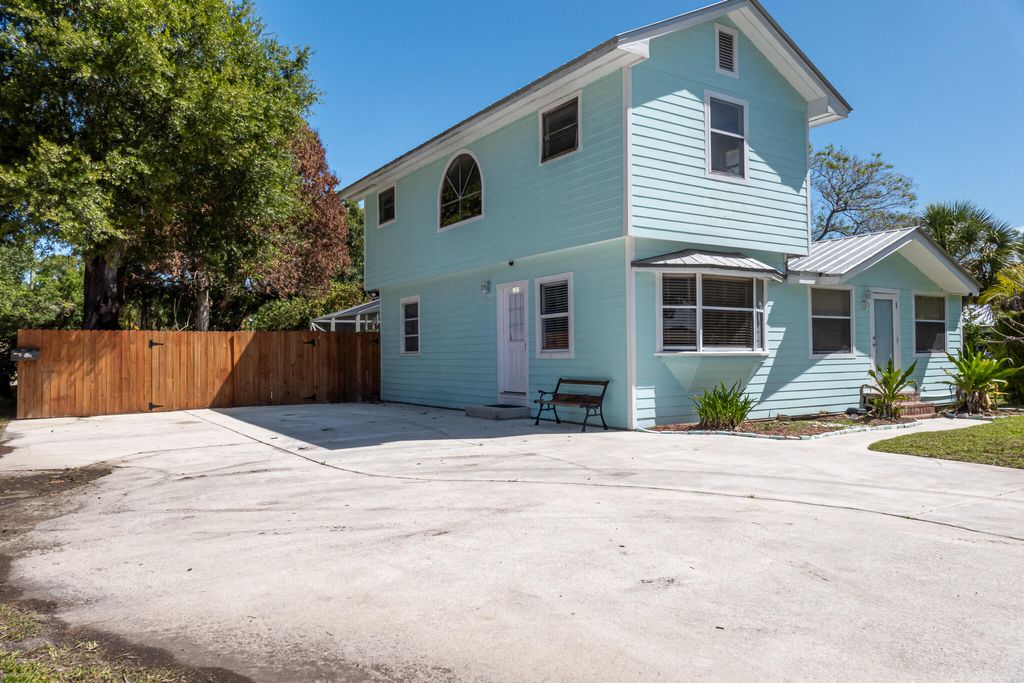 Photo of 520 Tumblin Kling Road, Fort Pierce, FL 34982 (MLS # R11160887)
