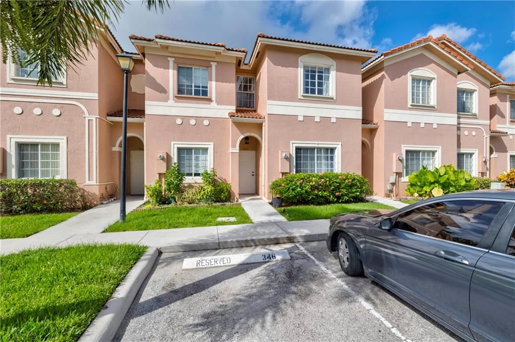 Photo of 7804 Catalina Cir Cir, Tamarac, FL 33321 (MLS # F10342784)