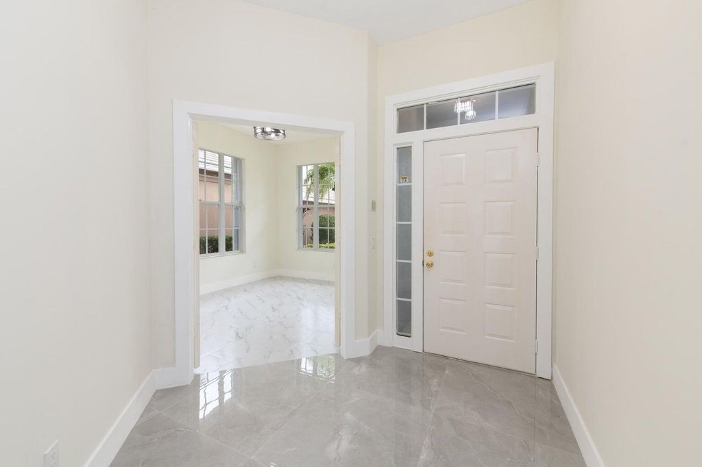 Photo of 249 NW Bentley Circle, Port Saint Lucie, FL 34986 (MLS # B26011939)