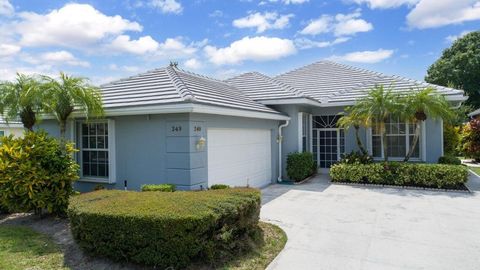Photo of 249 NW Bentley Circle, Port Saint Lucie, FL 34986 (MLS # B26011939)