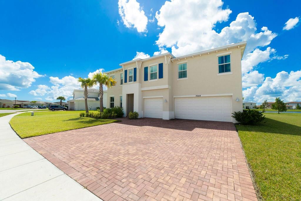 Photo of 7644 NW Old Grove Lane, Port Saint Lucie, FL 34987 (MLS # R11023341)